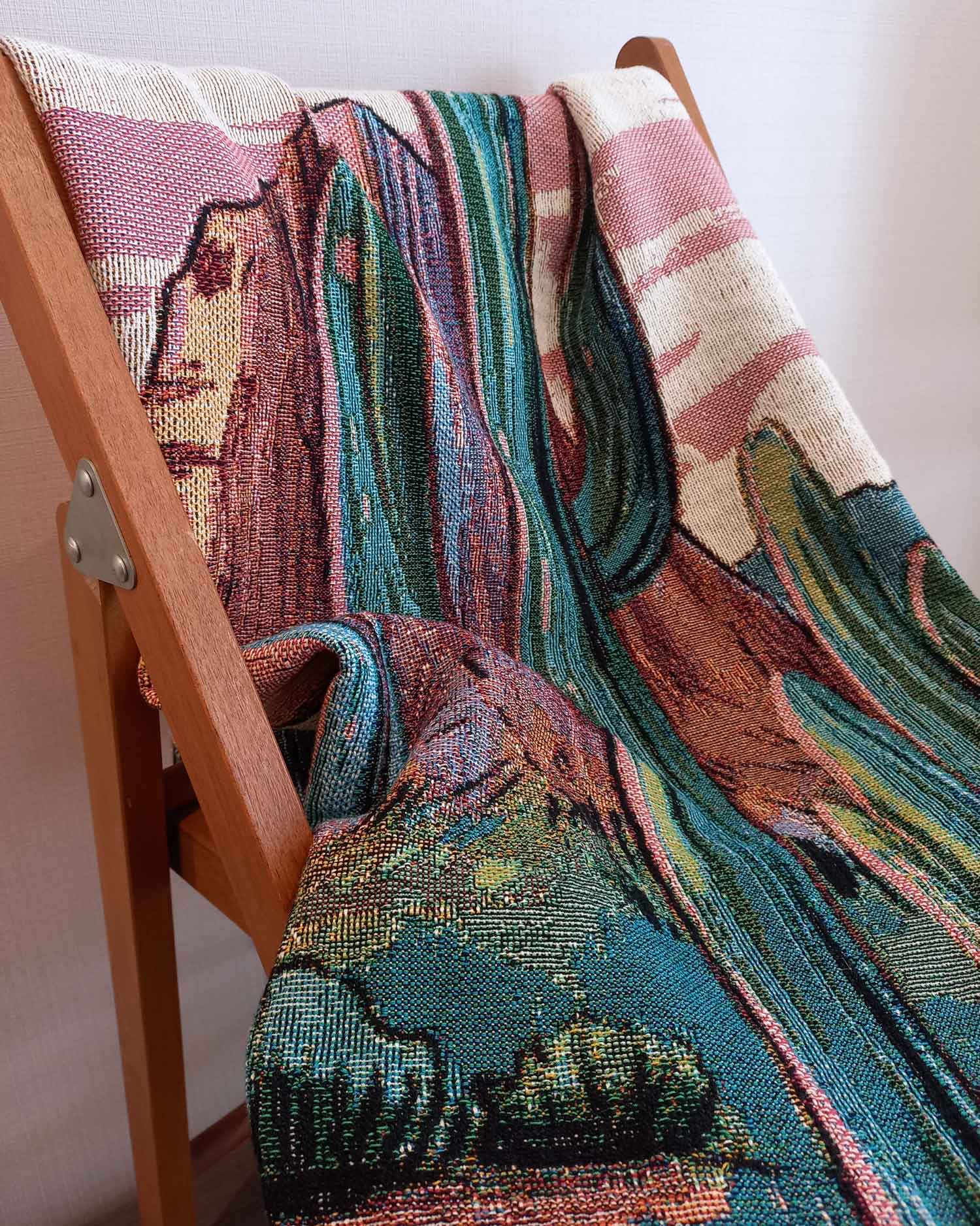 Desert Cactus Throw Blanket on a chair